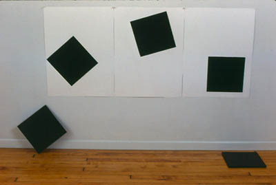  RICOCHET. &nbsp; 1988. Wall-floor work. Charcoal on paper, slate plates. Three paper units 22”x30” each Two slate plates 12”x12”x1/4” each. 